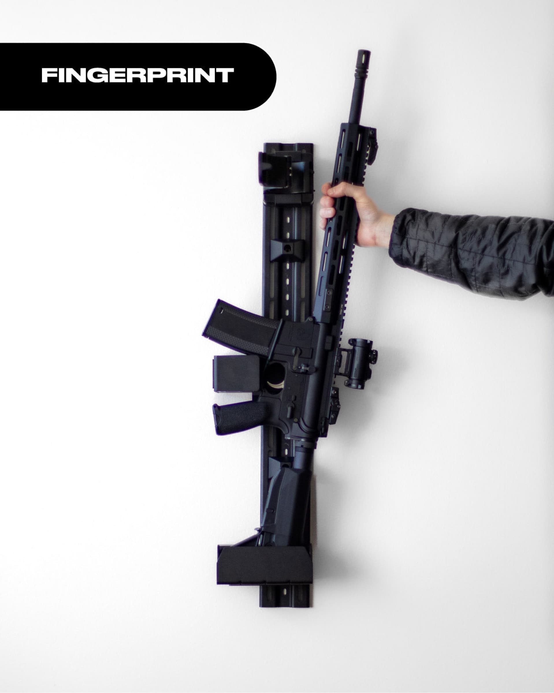 RACT Biometric holding an AR-style rifle on a wall, a hand gripping the rifle, labelled Fingerprint