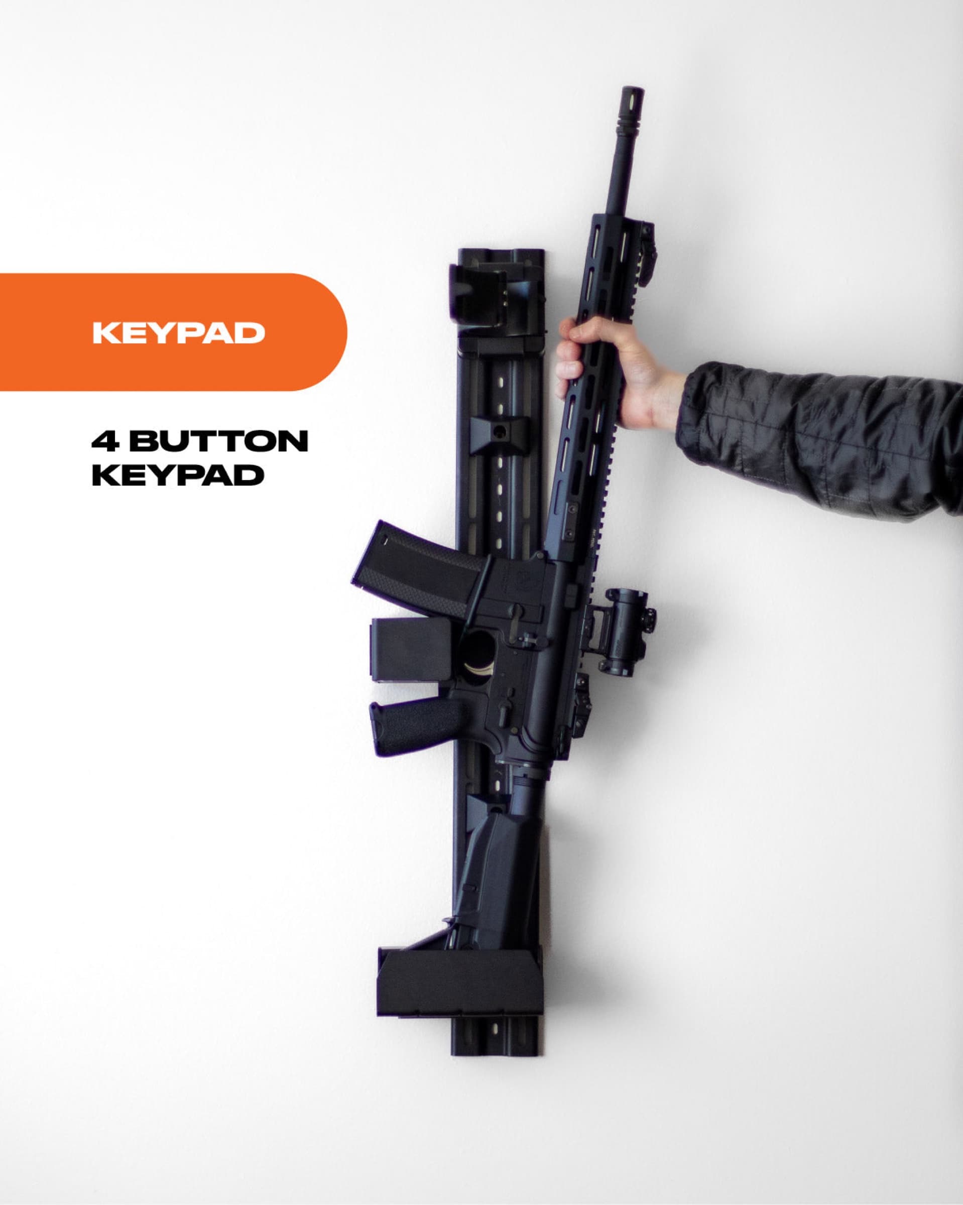 RACT Keypad holding an AR-style rifle on a wall, a hand gripping the rifle, labelled 4-button keypad